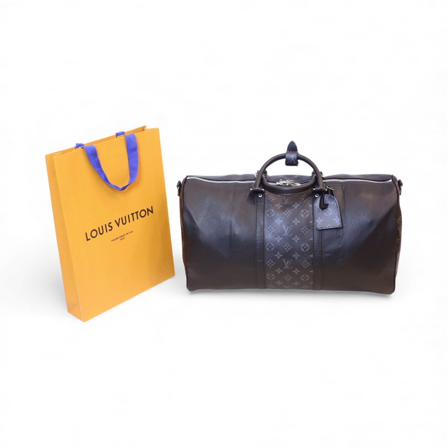 L-*V Hand bag