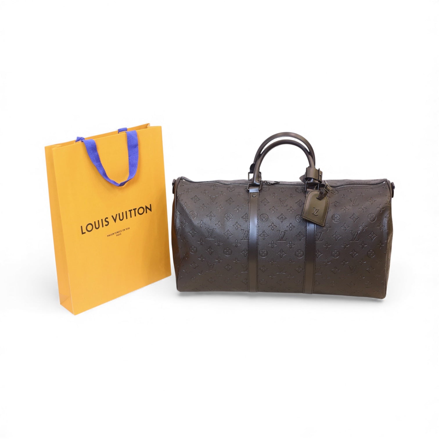 L-*V Hand bag