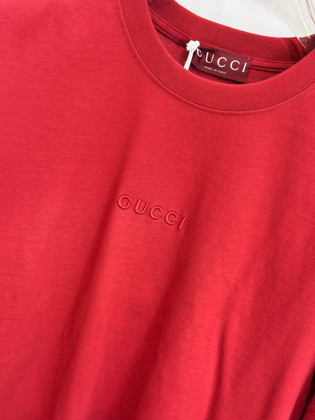 G-U-C-C-U T-shirt.