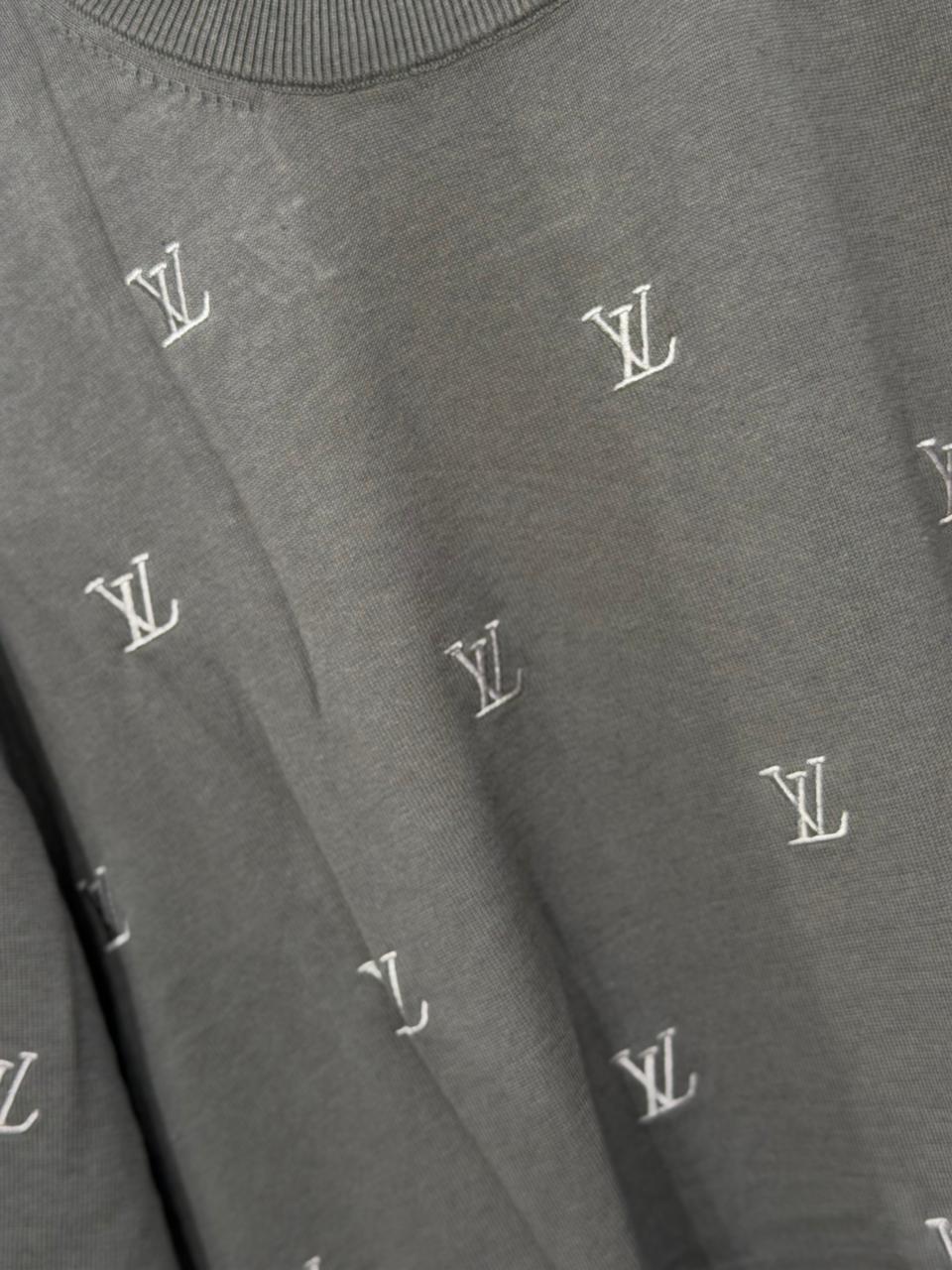 L-oui-s V-u-iton t-shirt.